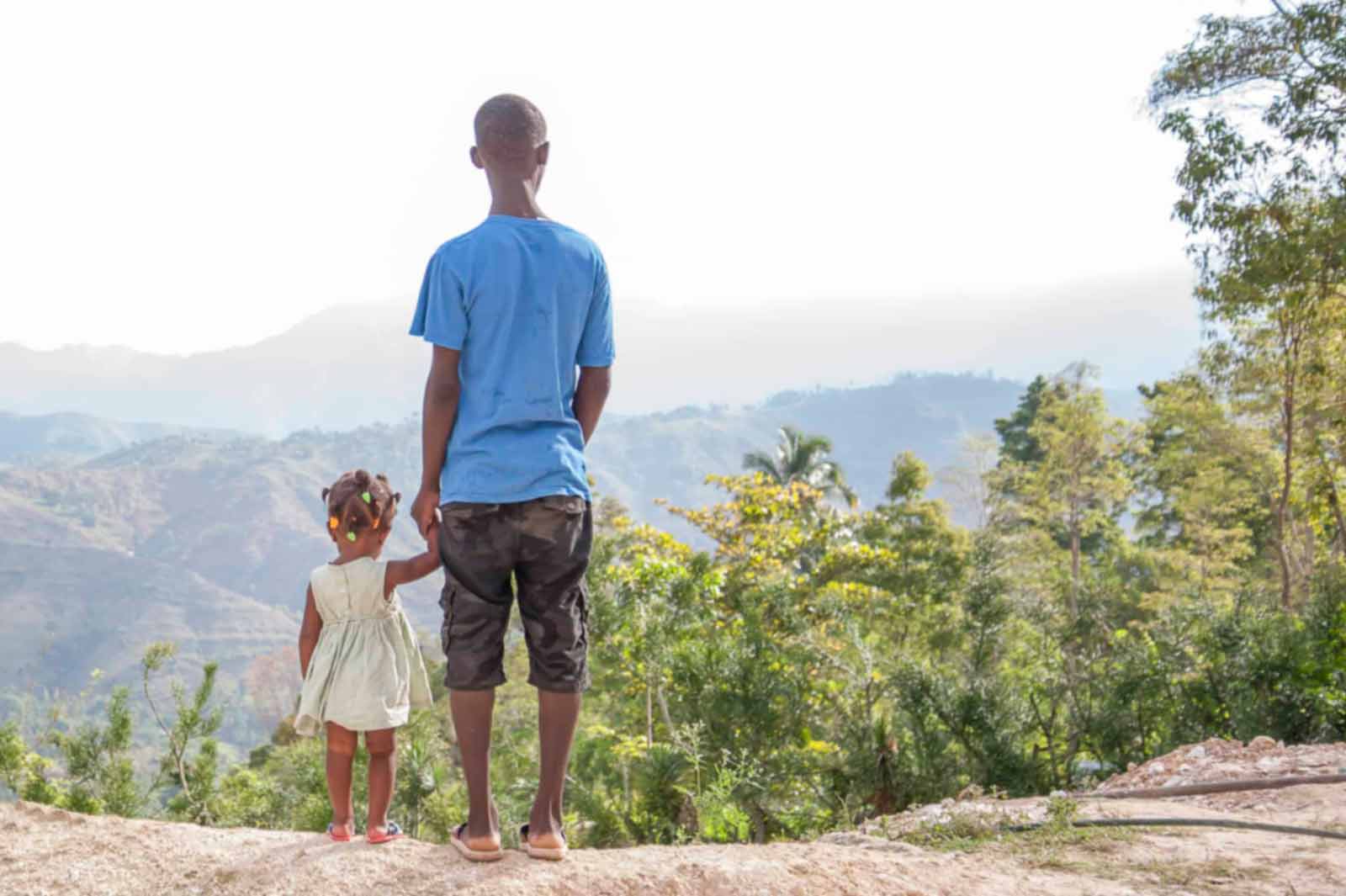 Volunteers working with community members in Timo, Haiti